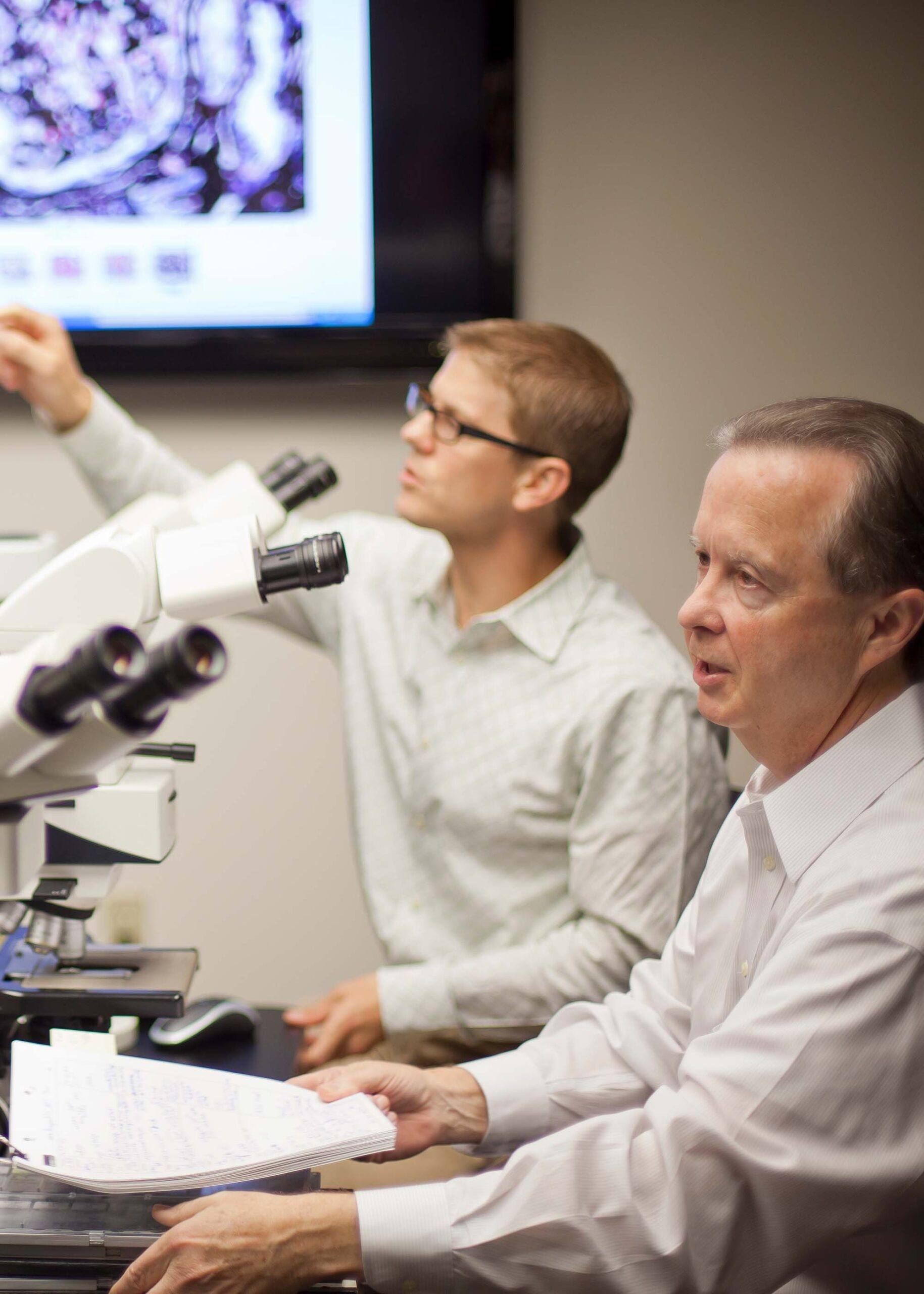 Dr. Walker teaching Dr. Larsen about renal pathology in early days