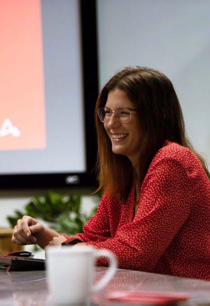 arkana team member smiling during a meeting careers at Arkana Laboratories