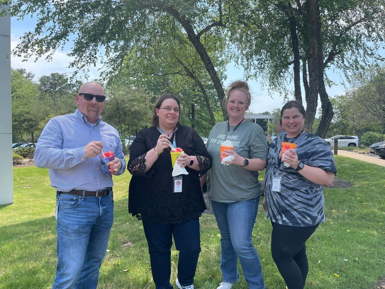 transcription team eating their snow cones outside