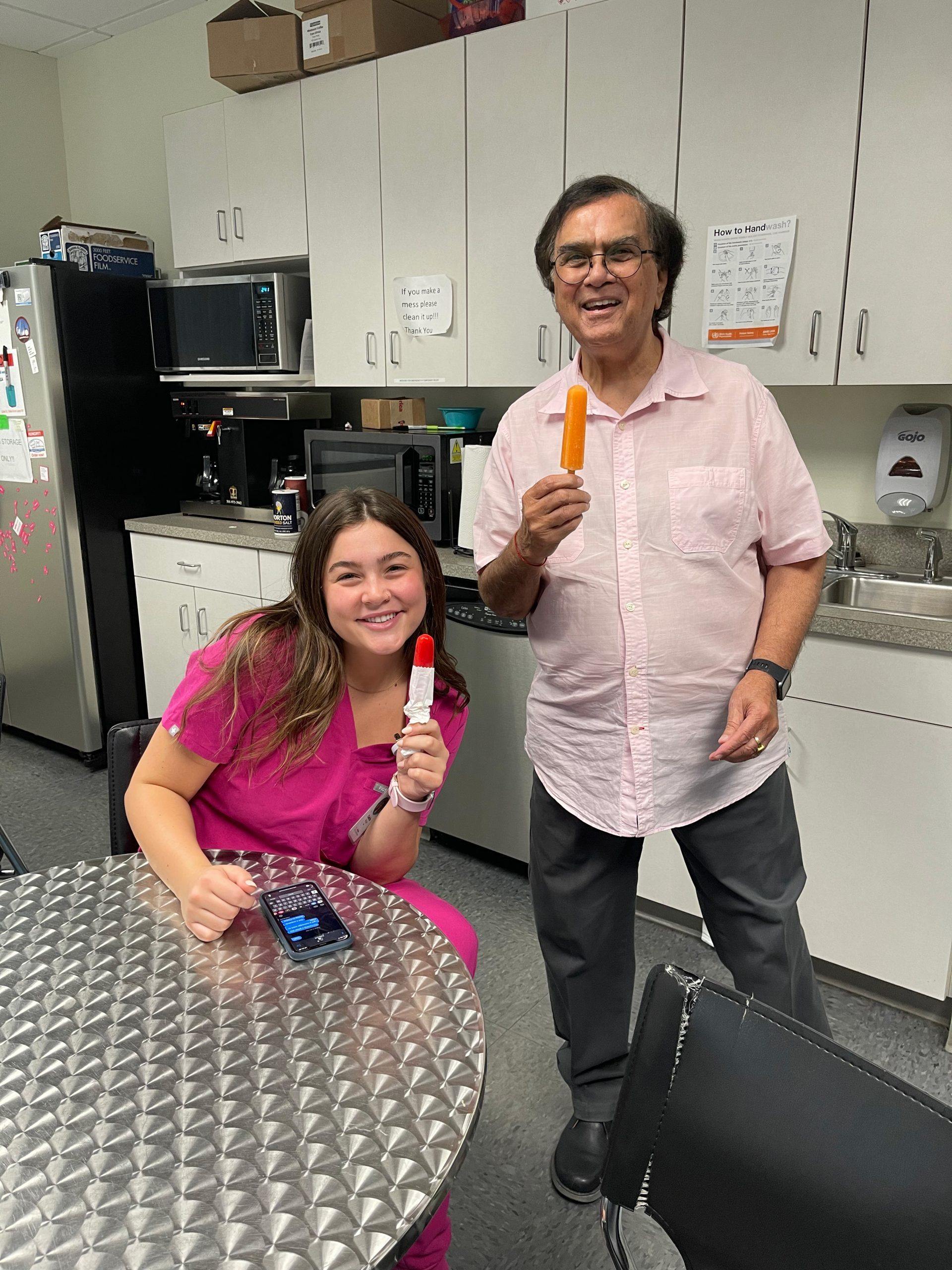 caddo and joshi with popsicles