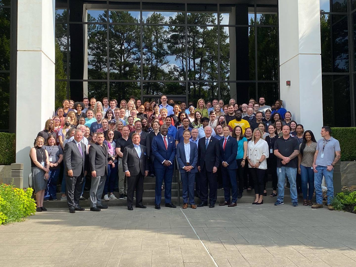 all of Arkana staff taking photo with AEDC, Gov hutchinson, and Little Rock Mayor Frank Scott Jr